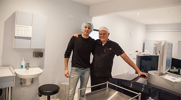 Rick Wolfe and Dylan Young smiling following completion. 