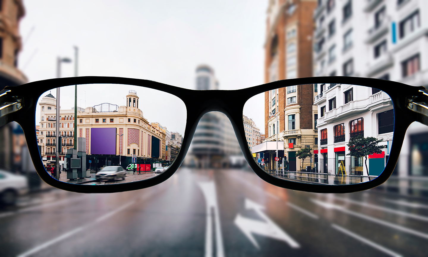 Blurry street view representing myopia, corrected through glasses- laser eye surgery for myopia Melbourne